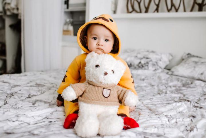 Cute little girl with teddy bear